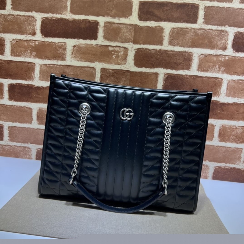 G*u*i shopping bags